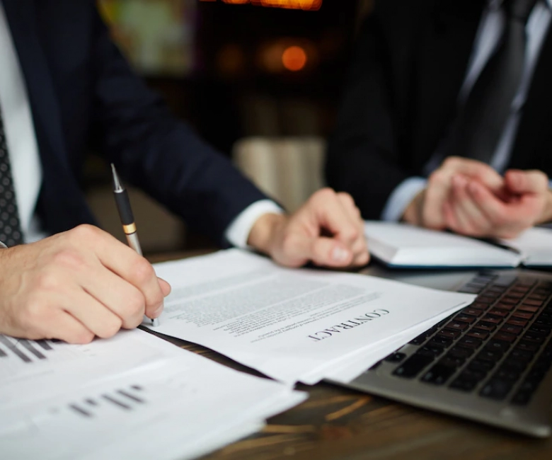 businessman-reading-contract-closeup_1098-14742
